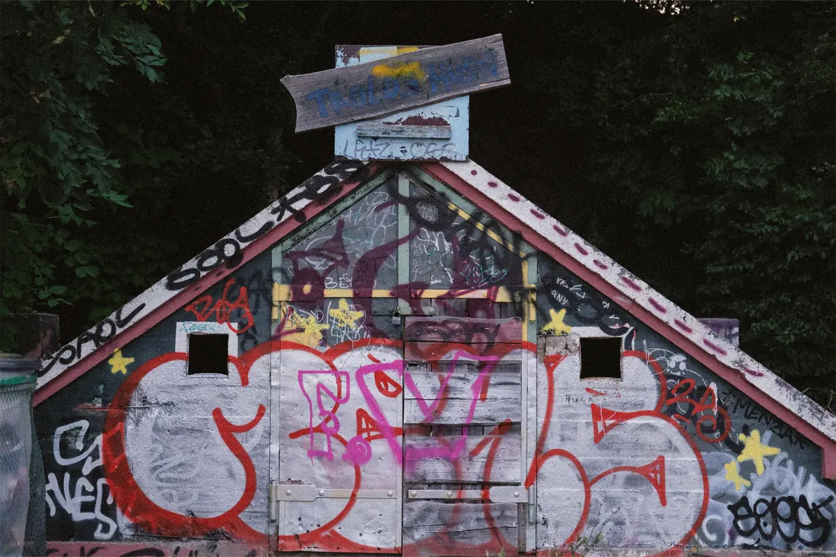 Small gabled house covered in graffiti in Copenhagen